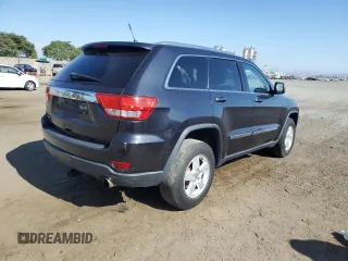 2012 Jeep Grand Cherokee Laredo with VIN 1C4RJEAG1CC334201, listed as a Copart auction lot 83696774 with 208,639 mi miles and Clean Title. Bid and sale history available at carsss.com. Image 3.
