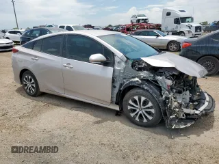2021 Toyota Prius LE z VIN JTDKAMFP8M3177157, wystawiony jako Copart lot #63668045 z przebiegiem 44 760 mil mil oraz Czysty tytuł • Clean title. Historia ofert i sprzedaży dostępna na DreamBid. Obrazek 4.