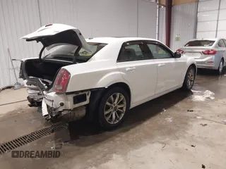 2014 Chrysler 300 with VIN 2C3CCAGGXEH384728, listed as a IAAI auction lot 41394638 with 151,362 mi miles. Bid and sale history available at carsss.com. Image 4.