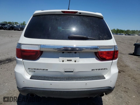 2013 Dodge Durango Citadel с VIN 1C4SDJET0DC512576, выставлен на аукционе Copart как лот 54809835 с пробегом 190 455 миль миль и Списание • Salvage title. История ставок и продаж доступна на DreamBid. Изображение 6.