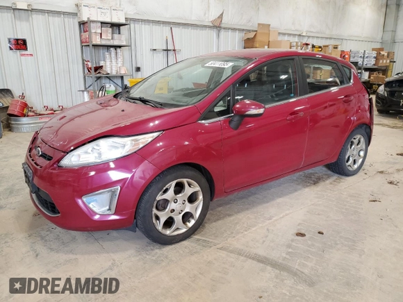 2011 Ford Fiesta SES with VIN 3FADP4FJ7BM176005, listed as a Copart auction lot 50411095 with 124,007 mi miles and Non Repairable. Bid and sale history available at carsss.com. Image 1.