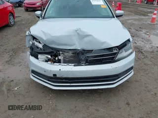 2017 Volkswagen Jetta S with VIN 3VW2B7AJ8HM328548, listed as a IAAI auction lot 42434695 with 123,236 mi miles and . Bid and sale history available at DreamBid. Image 6.