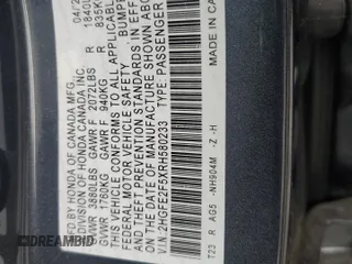 2024 Honda Civic Sport z VIN 2HGFE2F5XRH580233, wystawiony jako Copart lot #52956535 z przebiegiem 9852 mil mil oraz Szkody całkowita. Historia ofert i sprzedaży dostępna na DreamBid. Obrazek 14.