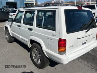 2000 Jeep Cherokee Classic with VIN 1J4FF58S4YL219673, listed as a Copart auction lot 48809075 with 198,334 mi miles and Salvage Title. Bid and sale history available at carsss.com. Image 3.