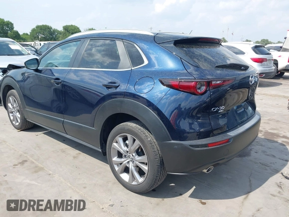 2023 Mazda CX-30 S Carbon Edition with VIN 3MVDMBCM4PM542160, listed as a IAAI auction lot 42175395 with 11,340 mi miles and . Bid and sale history available at DreamBid. Image 3.