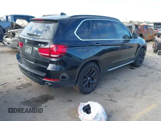 2014 BMW X5 xDrive35d with VIN 5UXKS4C5XE0J95127, listed as a IAAI auction lot 41755847 with 145,539 mi miles. Bid and sale history available at carsss.com. Image 4.