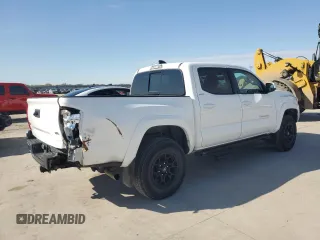 2022 Toyota Tacoma SR with VIN 3TMCZ5AN3NM506811, listed as a Copart auction lot 84630754 with 32,099 mi miles and Salvage title. Bid and sale history available at DreamBid. Image 3.