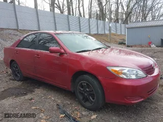 2002 Toyota Camry LE with VIN 4T1BE32K42U099357, listed as a IAAI auction lot 42075943 with 191,685 mi miles. Bid and sale history available at carsss.com. Image 1.