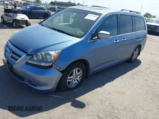 2006 Honda Odyssey EX-L with VIN 5FNRL38726B108311, listed as a IAAI auction lot 42203838 with 205,201 mi miles and . Bid and sale history available at DreamBid. Image 2.