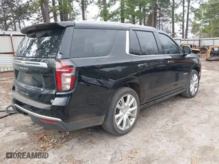 2023 Chevrolet Tahoe High Country with VIN 1GNSKTKT8PR441562, listed as a IAAI auction lot 41544253 with 24,453 mi miles. Bid and sale history available at carsss.com. Image 4.