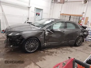 2015 Lincoln MKZ Hybrid z VIN 3LN6L2LU0FR624283, wystawiony jako IAAI lot #41402447 z przebiegiem 79 883 mil mil oraz . Historia ofert i sprzedaży dostępna na DreamBid. Obrazek 15.