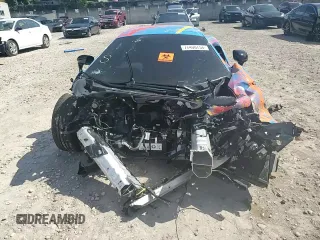 2019 McLaren 570S z VIN SBM13FAA9KW006456, wystawiony jako Copart lot #77400754 z przebiegiem Nie podano mil oraz Nie do naprawy. Historia ofert i sprzedaży dostępna na DreamBid. Obrazek 13.