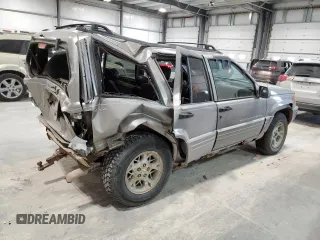 1997 Jeep Grand Cherokee Limited with VIN 1J4GZ78Y4VC589688, listed as a Copart auction lot 84673974 with 183,930 mi miles and Salvage Title. Bid and sale history available at carsss.com. Image 3.