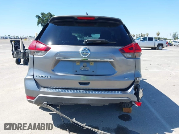 2017 Nissan Rogue SV with VIN KNMAT2MT9HP581822, listed as a IAAI auction lot 42140794 with 74,261 mi miles. Bid and sale history available at carsss.com. Image 16.