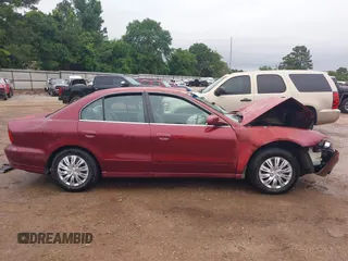 2003 Mitsubishi Galant ES z VIN 4A3AA46G83E113499, wystawiony jako IAAI lot #42192050 z przebiegiem Nie podano mil oraz . Historia ofert i sprzedaży dostępna na DreamBid. Obrazek 14.