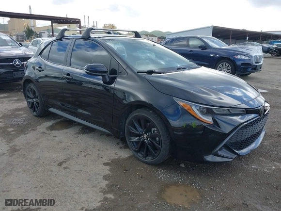 2022 Toyota Corolla Hatchback SE with VIN JTND4MBE4N3179571, listed as a IAAI auction lot 41812141 with 54,713 mi miles. Bid and sale history available at carsss.com. Image 1.
