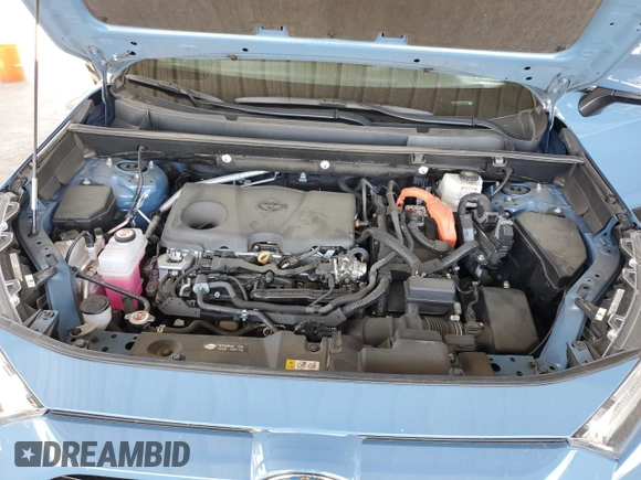 2022 Toyota RAV4 Hybrid SE with VIN 4T3T6RFV7NU103423, listed as a Copart auction lot 59709215 with 27,595 mi miles and Salvage title. Bid and sale history available at DreamBid. Image 11.