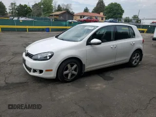 2014 Volkswagen Golf with VIN WVWDB7AJ0EW001424, listed as a Copart auction lot 62420115 with 69,109 mi miles and Salvage title. Bid and sale history available at DreamBid. Image 1.