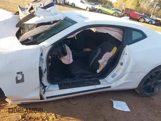 2019 Chevrolet Camaro 1LT z VIN 1G1FB1RX4K0127436, wystawiony jako IAAI lot #41868960 z przebiegiem Nie podano mil oraz . Historia ofert i sprzedaży dostępna na DreamBid. Obrazek 13.