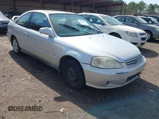 1999 Honda Civic EX with VIN 1HGEJ8241XL070974, listed as a IAAI auction lot 41594763 with 311,729 mi miles. Bid and sale history available at carsss.com. Image 1.