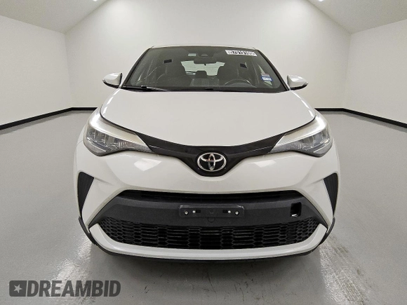 2021 Toyota C-HR LE z VIN NMTKHMBX0MR120577, wystawiony jako Copart lot #57019105 z przebiegiem 152 488 mil mil oraz Czysty tytuł • Clean title. Historia ofert i sprzedaży dostępna na DreamBid. Obrazek 5.