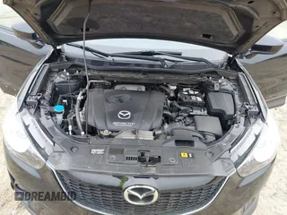 2014 Mazda CX-5 Touring with VIN JM3KE2CY7E0341658, listed as a IAAI auction lot 41915807 with 99,287 mi miles. Bid and sale history available at carsss.com. Image 10.