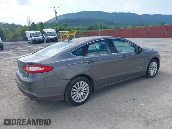 2014 Ford Fusion SE Hybrid with VIN 3FA6P0LU3ER152517, listed as a IAAI auction lot 42801042 with 209,898 mi miles and . Bid and sale history available at DreamBid. Image 4.