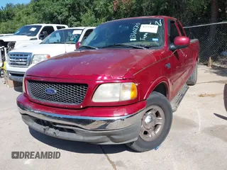 2002 Ford F-150 XL with VIN 1FTRX17W02KB40270, listed as a IAAI auction lot 42573017 with Not provided miles and . Bid and sale history available at DreamBid. Image 2.