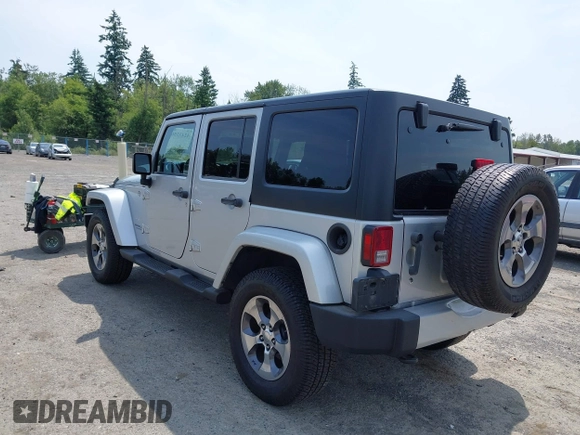 2012 Jeep Wrangler Unlimited Altitude with VIN 1C4HJWEG2CL140059, listed as a IAAI auction lot 42433563 with 189,868 mi miles and . Bid and sale history available at DreamBid. Image 3.