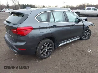 2021 BMW X1 xDrive28i with VIN WBXJG9C06M5S05303, listed as a IAAI auction lot 41060130 with 29,644 mi miles. Bid and sale history available at carsss.com. Image 4.