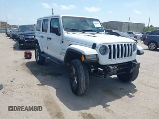 2018 Jeep Wrangler Unlimited Sahara z VIN 1C4HJXEG0JW245118, wystawiony jako IAAI lot #42066614 z przebiegiem 83 743 mil mil oraz . Historia ofert i sprzedaży dostępna na DreamBid. Obrazek 1.