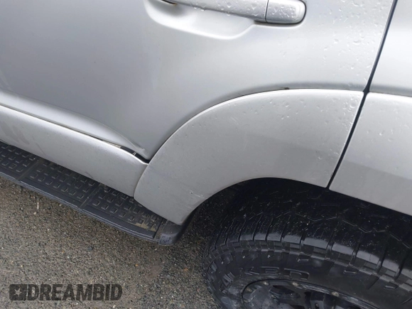2004 Toyota 4Runner SR5 with VIN JTEBU14R240023681, listed as a IAAI auction lot 41870146 with 214,015 mi miles and . Bid and sale history available at DreamBid. Image 17.