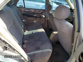 2000 Chevrolet Prizm z VIN 1Y1SK5284YZ407566, wystawiony jako Copart lot #86148464 z przebiegiem 193 844 mil mil oraz Szkoda całkowita • Salvage title. Historia ofert i sprzedaży dostępna na DreamBid. Obrazek 10.