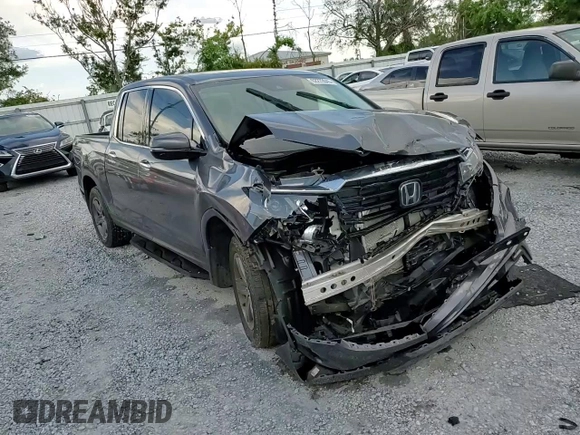 2023 Honda Ridgeline RTL-E with VIN 5FPYK3F79PB010418, listed as a Copart auction lot 62272845 with 39,739 mi miles and Salvage title. Bid and sale history available at DreamBid. Image 13.