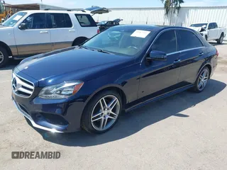 2014 Mercedes-Benz E 350 Sport with VIN WDDHF5KB2EA997989, listed as a IAAI auction lot 42067922 with 57,119 mi miles and . Bid and sale history available at DreamBid. Image 2.