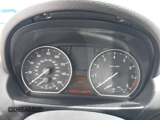 2008 BMW 1 Series 135i with VIN WBAUC73598VF23878, listed as a IAAI auction lot 41569879 with 186,622 mi miles. Bid and sale history available at carsss.com. Image 7.