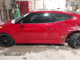 2012 Hyundai Veloster w/Black Int z VIN KMHTC6AD8CU032759, wystawiony jako IAAI lot #41567265 z przebiegiem 156 973 mil mil oraz . Historia ofert i sprzedaży dostępna na DreamBid. Obrazek 14.