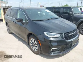 2023 Chrysler Pacifica Hybrid Touring L with VIN 2C4RC1L75PR592251, listed as a IAAI auction lot 42037873 with 44,428 mi miles and . Bid and sale history available at DreamBid. Image 1.
