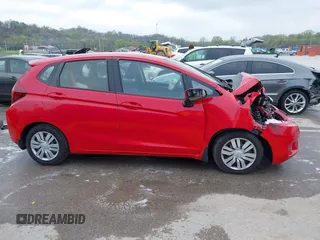 2016 Honda Fit LX with VIN JHMGK5H59GS008911, listed as a IAAI auction lot 42002981 with 96,224 mi miles and . Bid and sale history available at DreamBid. Image 14.