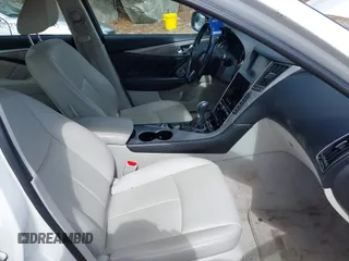 2015 Infiniti Q50 Premium z VIN JN1BV7ARXFM399617, wystawiony jako IAAI lot #41884672 z przebiegiem 116 320 mil mil oraz . Historia ofert i sprzedaży dostępna na DreamBid. Obrazek 5.