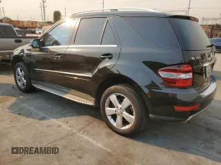 2009 Mercedes-Benz M 3.5L with VIN 4JGBB56E49A525018, listed as a Copart auction lot 41614175 with 154,428 mi miles and Salvage Title. Bid and sale history available at carsss.com. Image 2.
