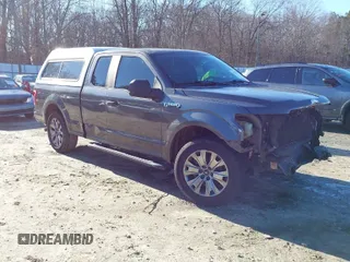2015 Ford F-150 XL with VIN 1FTEX1C85FKD46390, listed as a IAAI auction lot 41367960 with 209,889 mi miles. Bid and sale history available at carsss.com. Image 1.
