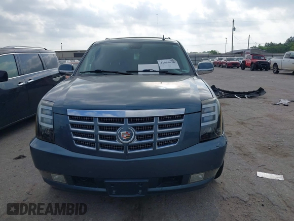 2009 Cadillac Escalade z VIN 1GYFK23249R136552, wystawiony jako IAAI lot #42055626 z przebiegiem 196 234 mil mil oraz . Historia ofert i sprzedaży dostępna na DreamBid. Obrazek 13.