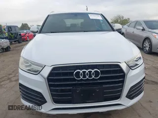 2018 Audi Q3 Premium z VIN WA1BCCFSXJR028356, wystawiony jako IAAI lot #41761544 z przebiegiem 82 877 mil mil oraz . Historia ofert i sprzedaży dostępna na DreamBid. Obrazek 13.
