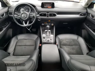 2019 Mazda CX-5 Touring with VIN JM3KFBCMXK0632631, listed as a Copart auction lot 45414485 with 80,795 mi miles and Salvage Title. Bid and sale history available at DreamBid. Image 8.