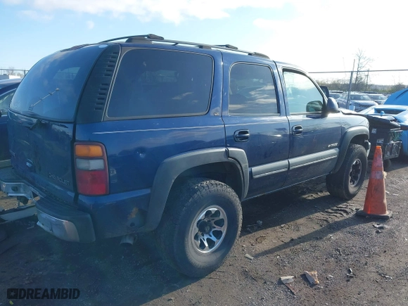 2002 Chevrolet Tahoe LT with VIN 1GNEK13Z42J140816, listed as a IAAI auction lot 41973686 with 241,722 mi miles. Bid and sale history available at carsss.com. Image 4.