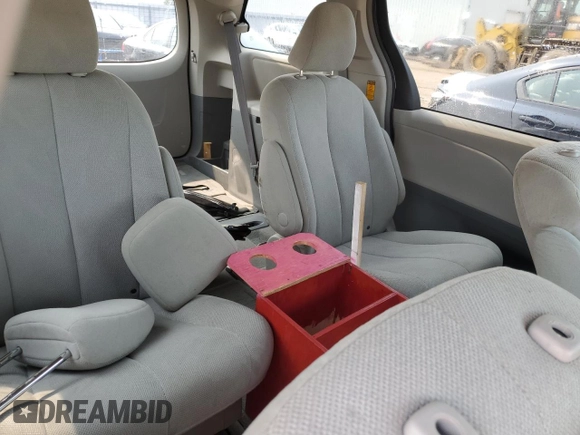 2014 Toyota Sienna L with VIN 5TDZK3DC8ES442973, listed as a Copart auction lot 59660055 with 310,496 mi miles and Salvage title. Bid and sale history available at DreamBid. Image 11.