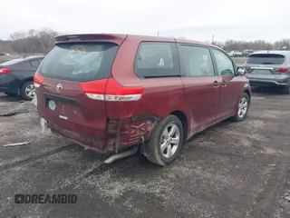 2014 Toyota Sienna L with VIN 5TDZK3DC8ES477402, listed as a IAAI auction lot 41494073 with 102,063 mi miles. Bid and sale history available at carsss.com. Image 4.