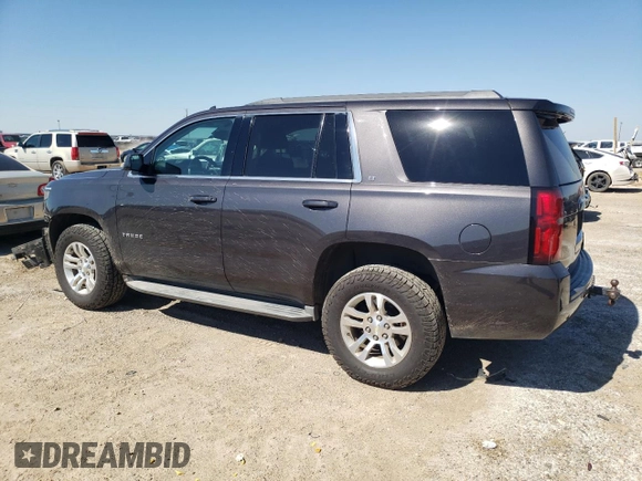 2015 Chevrolet Tahoe LT with VIN 1GNSCBKC2FR107792, listed as a Copart auction lot 67321104 with 184,438 mi miles and Clean title. Bid and sale history available at DreamBid. Image 2.
