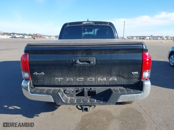 2019 Toyota Tacoma 4WD SR5 with VIN 3TMDZ5BN1KM060088, listed as a IAAI auction lot 41804525 with 69,893 mi miles. Bid and sale history available at carsss.com. Image 16.